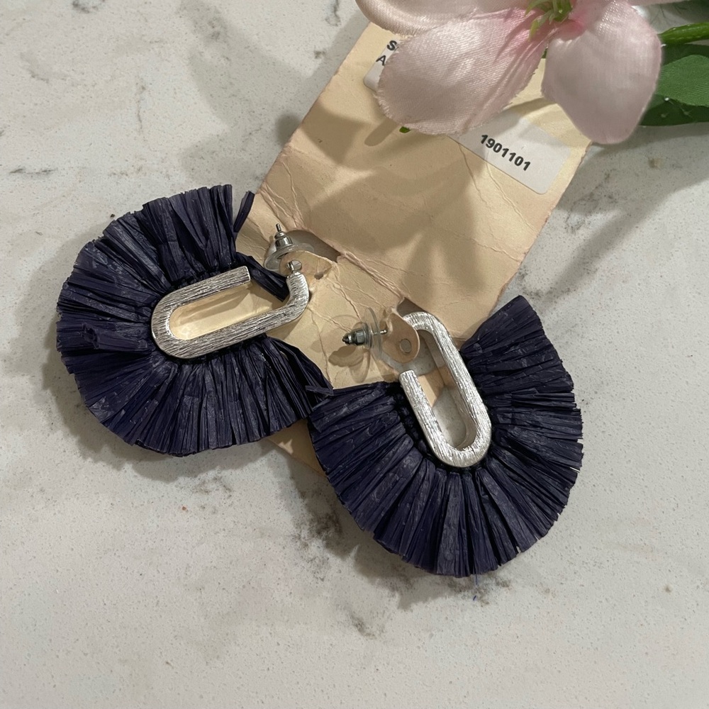 Navy blue tassel earrings on silver loop. Never worn.
